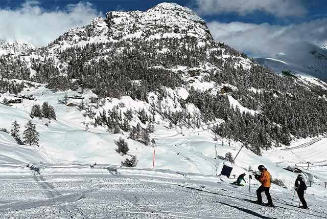 People standing on a ski slope