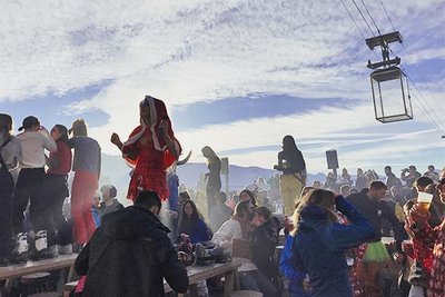 people dancing on an apres ski terrace in France