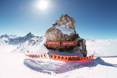 Signs in the middle of a ski piste