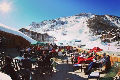 Bar terrace next to a ski piste