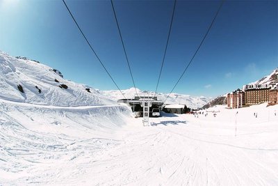 ski lift cables over a ski piste